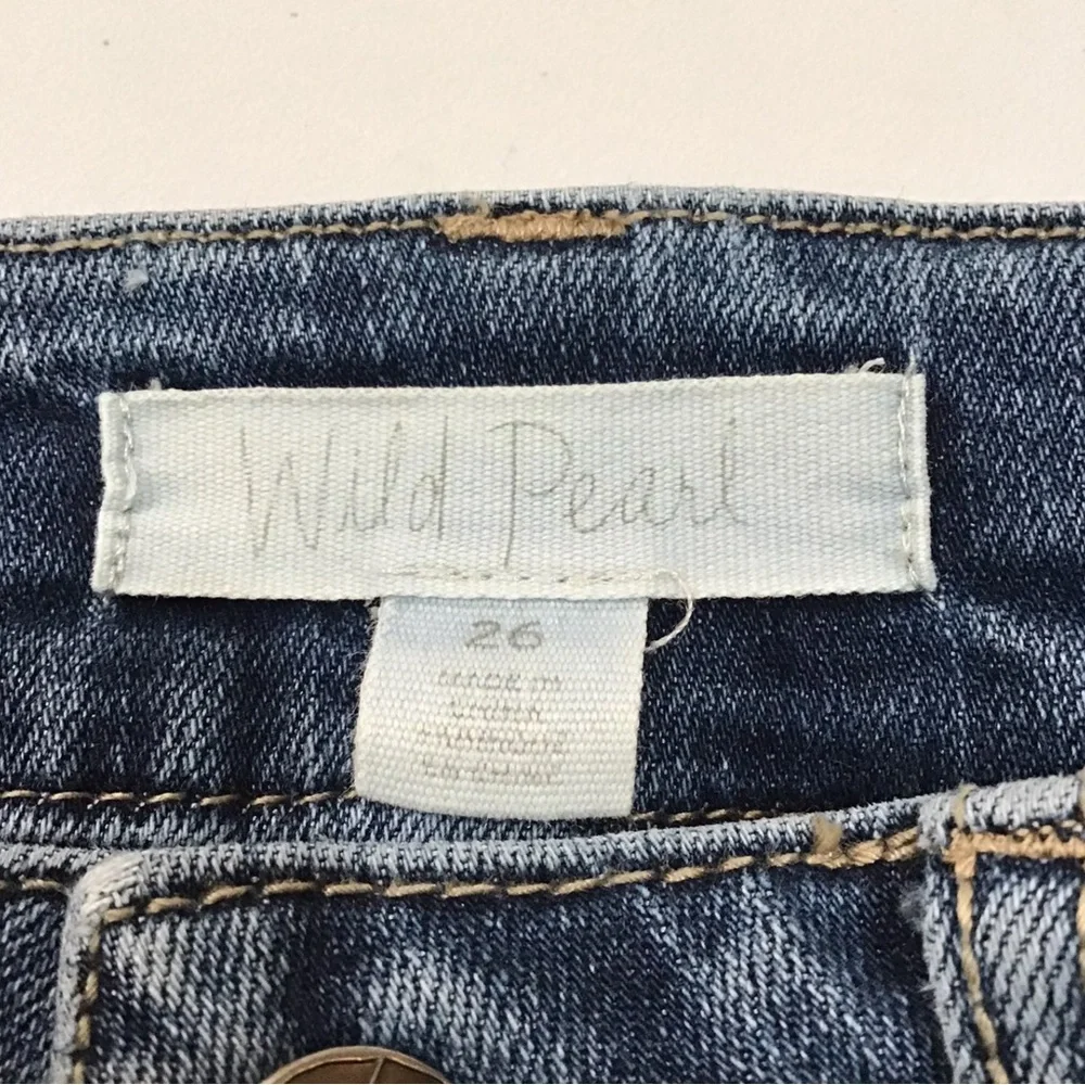 Wild Pearl Distressed Jean Mini Skirt